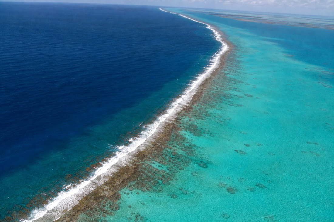 Aerial view of snorkeling the Belize Barrier Reef, the Belizean section of the second-largest reef system in the world